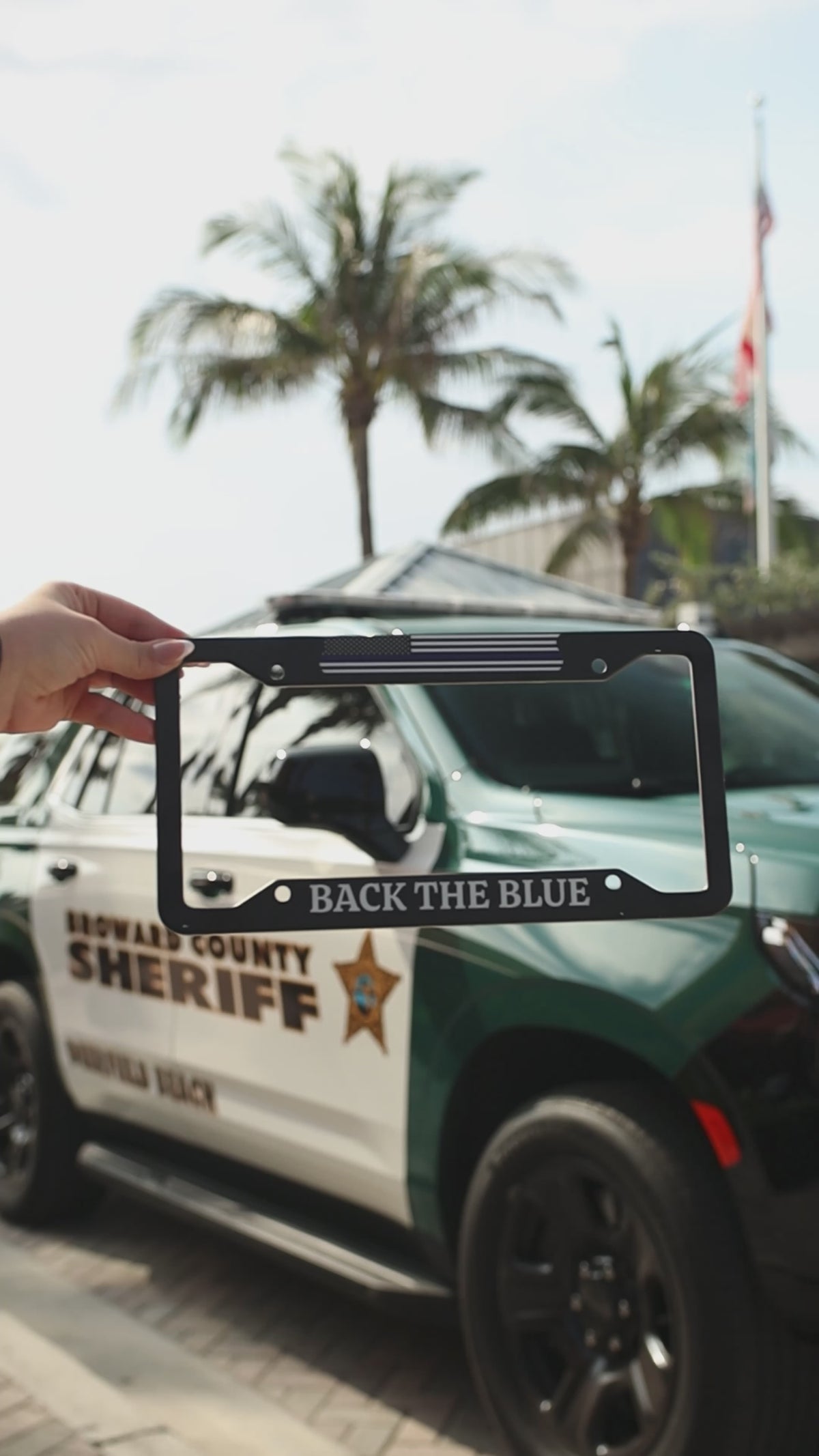 Support Police License Plate Frame with the police car on the background